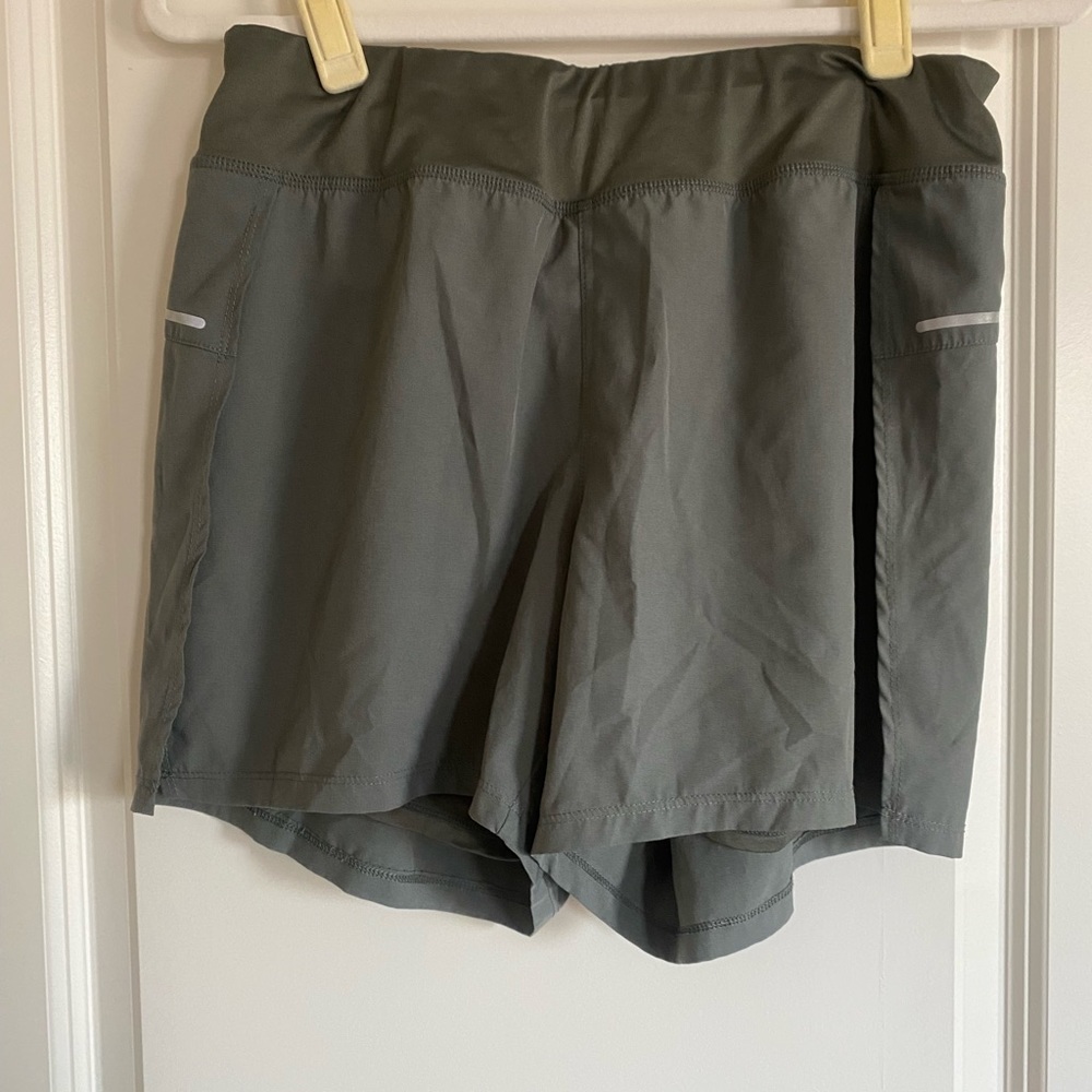 Olive green athletic shorts. Size M.